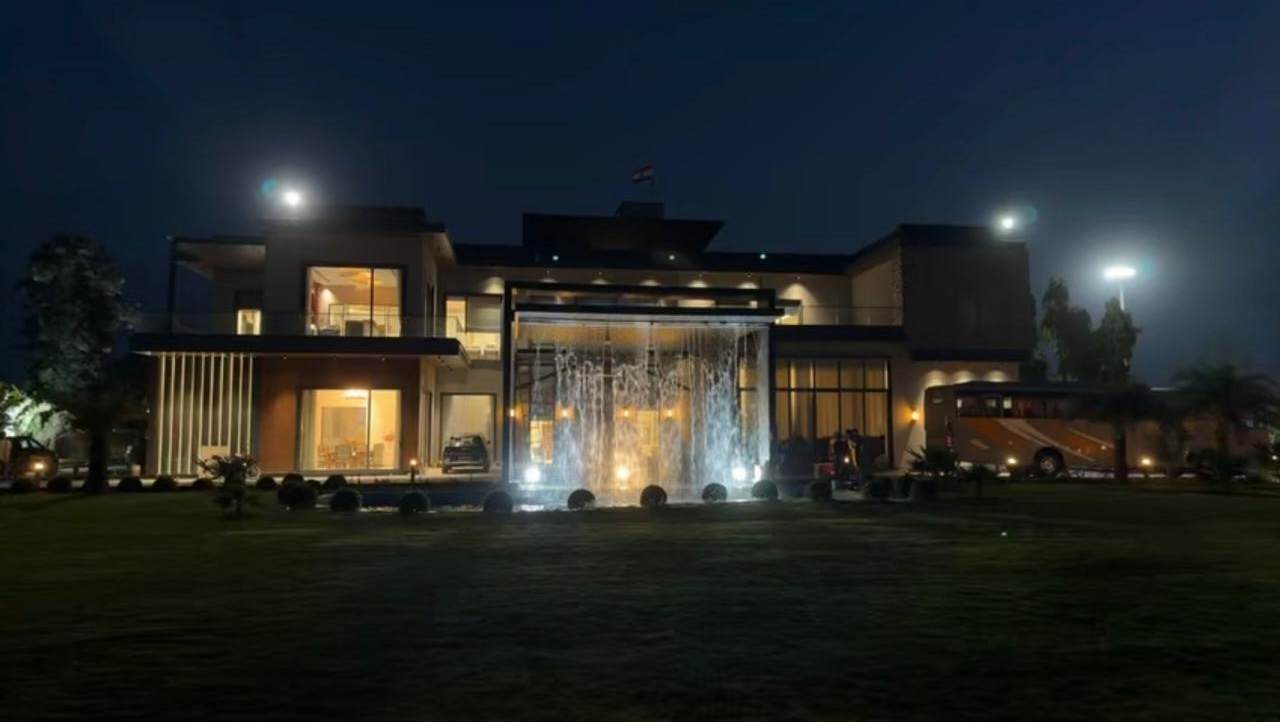 Alvion by Bliss villa and lawn illuminated at night